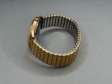 an image of a close up of a wrist watch on a table