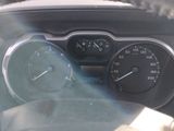 a close up of a car dashboard with a steering wheel