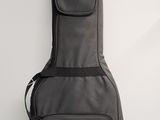 an image of a guitar case sitting against a wall