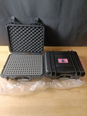 two cases that are sitting on a table