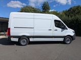 a white van that is parked in the parking lot
