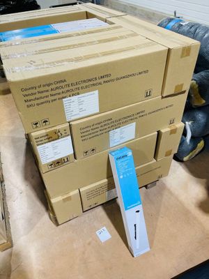 several boxes of electronic equipment are stacked on top of each other