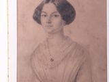 portrait of a woman in a white dress with a necklace and earrings