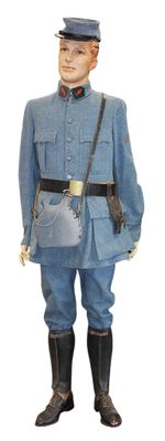 a figurine of a man dressed in a blue uniform