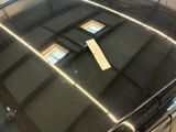 a parking ticket on the windshield of a car