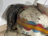 a statue of a horse that is on the floor