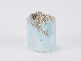 a close up of a piece of ice on a white surface