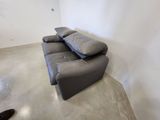 an image of a living room with a couch and a television