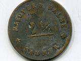 une vieille pièce de monnaie sur laquelle figure l'image d'un homme à cheval