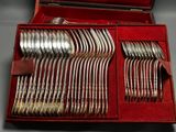 a red box with a set of silverware in it
