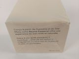 an image of a box of cream on a white surface