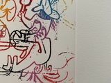 a drawing on the wall of a bathroom with graffiti on it