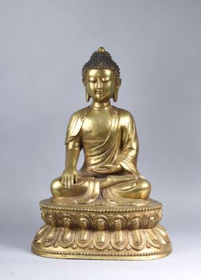 Important sujet en bronze doré figurant le Bouddha assis en …