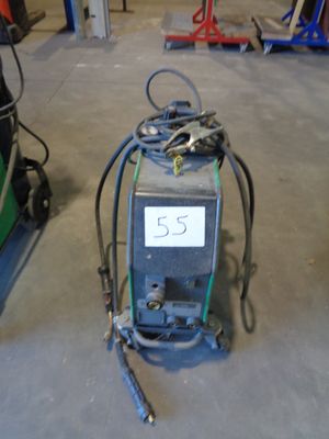 a machine that is sitting on the floor in the garage