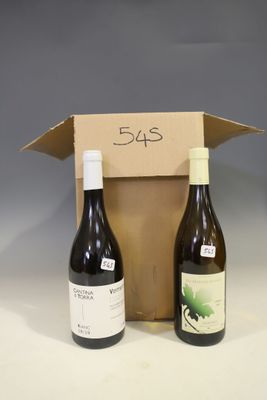 two bottles of wine sit in a cardboard box on a table