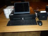 a desktop computer sitting on top of a wooden desk