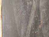 a picture of a piece of wood that has been scratched