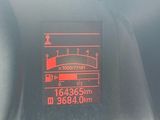 a digital display on the dashboard of a car