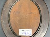 a picture of a metal plate with a label on it