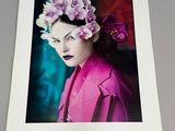 calendar with a photo of a woman with flowers in her hair