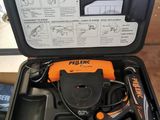 a tool in the case that is open on the floor