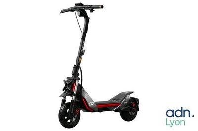 an image of a scooter is shown with the logo of a company