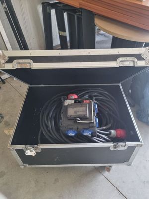 an open case with tools inside of it on the floor