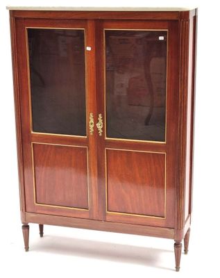 an image of a wooden cabinet with glass doors and brass handles