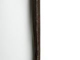 a close up of an old rusty wrenet on a white background