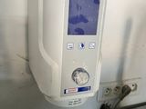 an image of a water dispenser on a wall