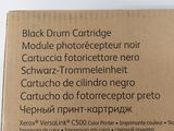 the back of a box of black drum cartridges on a white surface