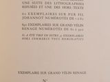 a close up of a book with a black and white title