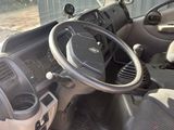 a picture of a car with a steering wheel and dashboard