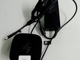 an image of a charger with a cord connected to it on a table