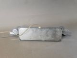 a metal box with a cord attached to it