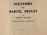 an old book with a black and white image of the title of a poem
