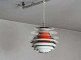 a light that is hanging from the ceiling in a room