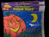 a close up of a bag of halloween decorations on a black background