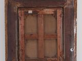 a picture of an old wooden window in the wall