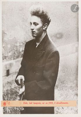 black and white photograph of a man with a gun in his hand