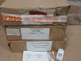 a stack of boxes sitting on a table with a price tag on it