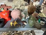 a shelf full of toys and other items in a room