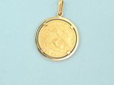 a close up of a gold coin on a blue surface