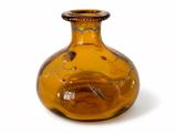 a yellow glass vase with a bird design on it