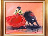 tableau représentant un taureau et une femme en robe rouge, dans un cadre doré