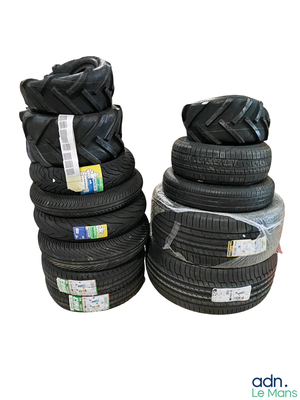 several tires stacked on top of each other on a white background