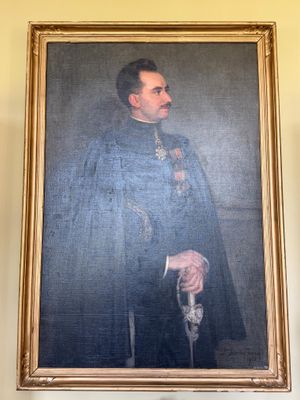 tableau représentant un homme vêtu d'une robe bleue et tenant une canne