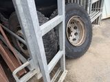 a truck that has a ladder next to it