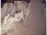 Photo de la NASA montrant un homme sur un snowboard dans la neige
