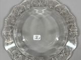 a clear glass plate with a chinese writing on it